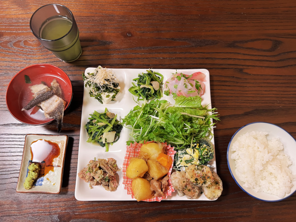 Traditional Japanese dinner served at Aogashimaya minshuku guesthouse in Aogashima